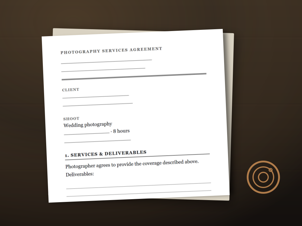 The photography contract template document staged on a desk
